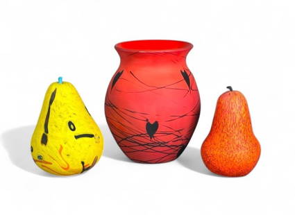 Three Piece Lot of Art Glass, Vase and Two Pear Forms: Three Piece Lot of Art Glass, comprising a vase in opaque orange glass with pulled and trailed hearts in black, together two blown glass pears. Unsigned. Dimensions: 8 in.h. of tallest. Condition: Ver