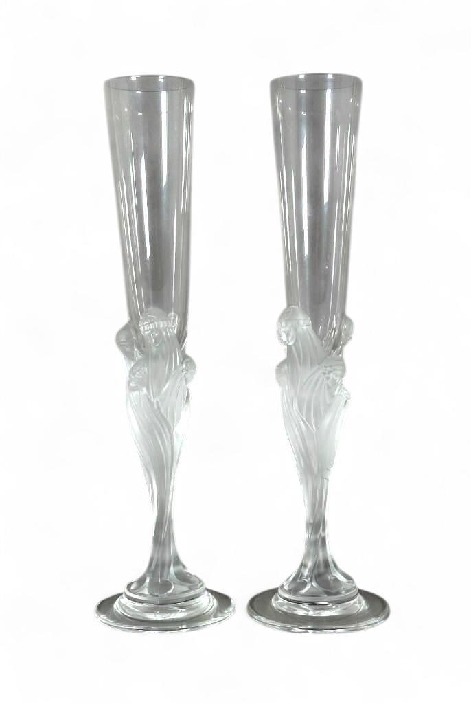 Pair of Erte Crystal 'Majestique' Champagne Flutes: Pair of Erte (Romain de Tirtoff, Russian/French 1892-1990) Crystal 'Majestique' Champagne Flutes, heavy forms molded with the figures of veiled women in flowing robes round the stem of the form. Molde
