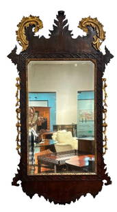 English George II Carved Mahogany and Parcel Gilt Wall Mirror, 18thc.: English George II Carved Mahogany and Parcel Gilt Wall Mirror, 18thc. Ex-Collection Gunston Hall Plantation, Mason Neck, Virginia. With foliate carved crest centering a pair of gilded foliate scrolls,