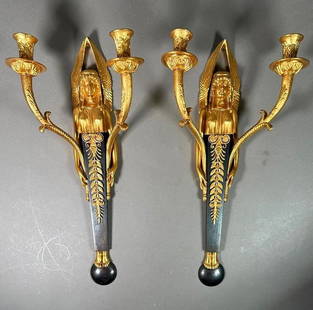 Pair of French Empire Style Bronze Two Light Wall Sconces: A Pair of French Empire Style Bronze Two Light Wall Sconces, cast in the form of Grecian maiden terms with long plaited hair over draped robes, each with hands at her side holding a pair of scrolled c