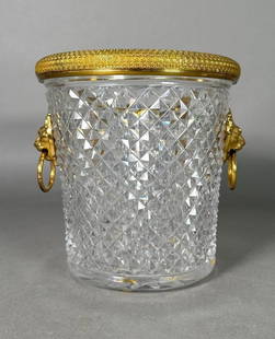 French Cut Crystal Bronze Mounted Ice or Champagne Pail: French Cut Crystal Bronze Mounted Ice or Champagne Pail, possibly Baccarat, of tapering cylindrical form cut with a diamond pattern, with gilt bronze lion and ring mask handles, with florette mounts t