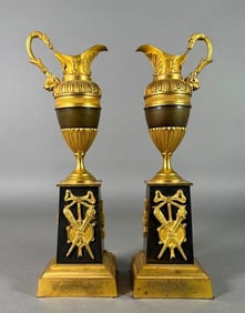 A Pair of French Empire Bronze and Ormolu Candlesticks in the Form of Ewers, 19thc.