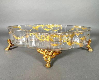 Gilded Crystal Centerpiece in Baccarat Gilt Bronze Stand: Gilded Crystal Centerpiece in Baccarat Gilt Bronze Stand, the lozenge shaped scallop rimmed crystal centerpiece or jardiniere enameled with gilded scrolls and flowers, fitted into a Baccarat gilt bron