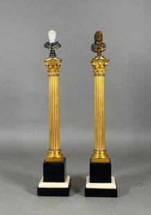 Two Gilt Bronze, Marble, and Carved Agate Columns with Roman Busts: Two Gilt Bronze, Marble, and Carved Agate Column Candlesticks with Roman Busts, formed as gilt bronze Corinthian capital columns, each topped with a carved stone bust, reversing to candlestick nozzle,