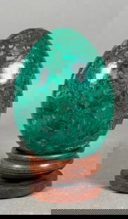 Large Polished Malachite Egg: Large Polished Malachite Egg. On wood base. Dimensions: 6.5 in.h. x 5.5 in.w. Condition: Very good.