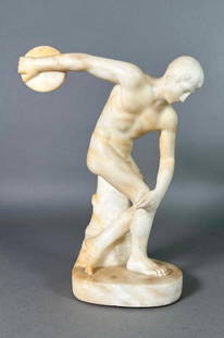 Carved Alabaster Figure of the Discobolus, After the Antique: Carved Alabaster Figure of the Discobolus, 19thc. After the Greek original by Myron. Raised on integral oval plinth. Dimensions: 11 in.h. x 8 in.w. x 4 in.d. Condition: Good. Front finger possibly rea