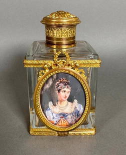 French Empire Crystal and Gilt Bronze Scent Bottle with Miniature Portrait of Empress Josephine: French Empire Crystal and Gilt Bronze Scent Bottle with Miniature Portrait of Empress Josephine, 19thc. Squared bottle form in clear crystal fitted to three sides with scroll forms centering an imperi