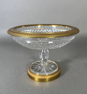French Bronze Mounted Crystal Compote: French Bronze Mounted Crystal Compote, heavy crystal form cut with a diamond and oval panel design, the rim fitted with an engine turned gilt bronze mount. Condition: Very good with no damage or resto