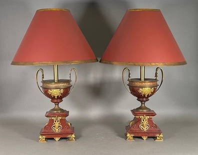 Pair of Napoleon III Marble and Bronze Urns Fashioned as Table Lamps: Pair of Napoleon III Marble and Bronze Urns Fashioned as Table Lamps, Red marble urn forms fitted with gilt bronze satyr masks, raised on large heavy red marble bases with gilt bronze mounts. Dimensio