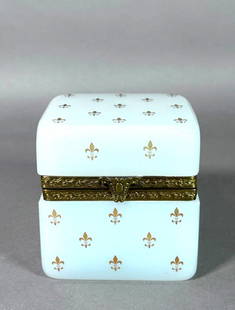 French Opaline Glass Box with Gilt Fleur de Lis Decoration: French Opaline Glass Box with Gilt Fleur de Lis Decoration, 19thc. Squared form in opaque white opaline glass, with hinged top fitted with bronze mounts. Dimensions: 4 x 3.75 x 3.5 in. Condition: Very