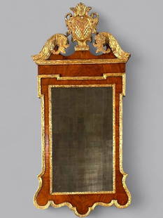 Small Size George II Walnut and Parcel Gilt Mirror, 18thc.: Small Size George II Walnut and Parcel Gilt Mirror, c.1740, the swan neck pediment surmounted by a carved and gilt wood cartouche with a foliate carved flourish, the surround in mahogany with carved g