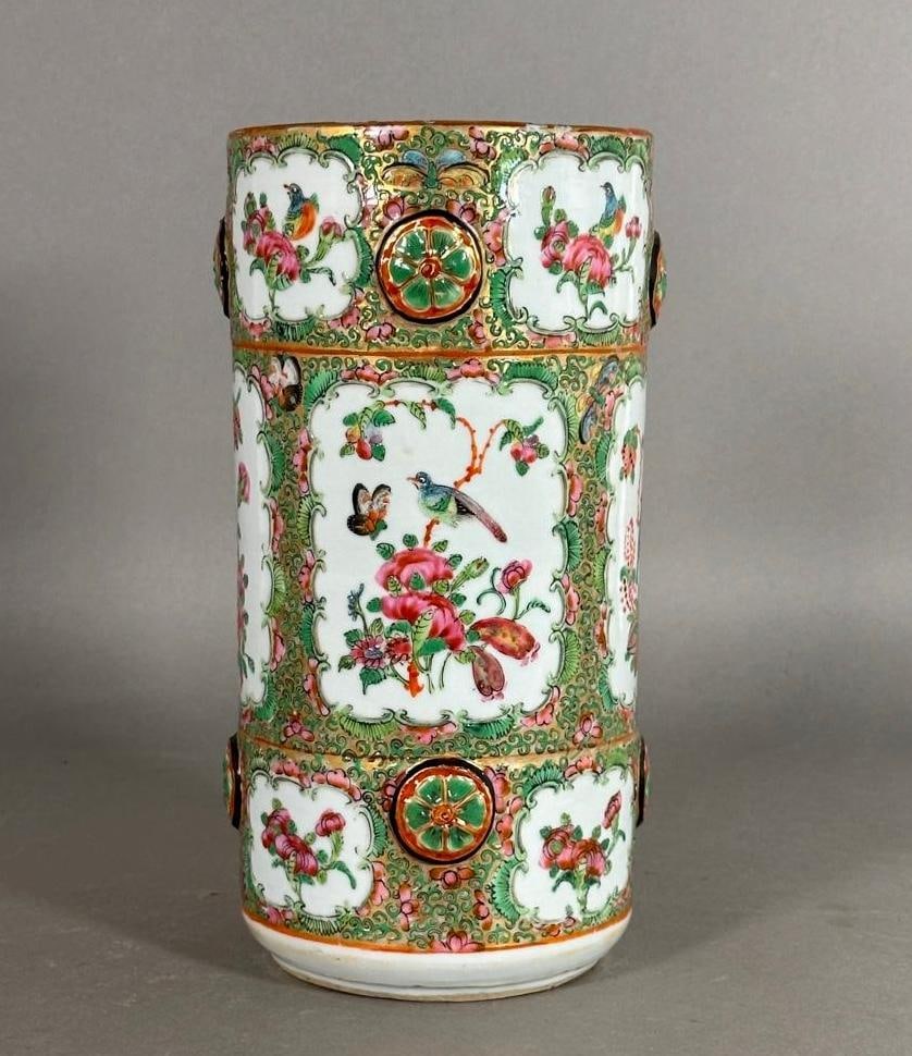 Chinese Famille Rose Porcelain Vase: Chinese Famille Rose Porcelain Vase, of cylindrical form decorated in reserves with birds on floral sprigs, with applied floral medallions around the form. Dimensions: 10 in.h. Condition: Chips to rim