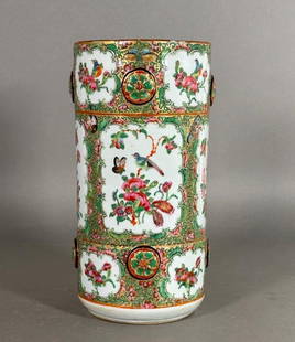 Chinese Famille Rose Porcelain Vase: Chinese Famille Rose Porcelain Vase, of cylindrical form decorated in reserves with birds on floral sprigs, with applied floral medallions around the form. Dimensions: 10 in.h. Condition: Chips to rim