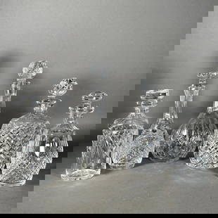 Lot of Five Crystal Decanters: Lot of Five Crystal Decanters, modern. Three are marked Waterford, one Wedgwood and one unmarked. Dimensions: 13 in. h. of tallest. Condition: Very good. Sold as is. Note: This lot is not guaranteed t