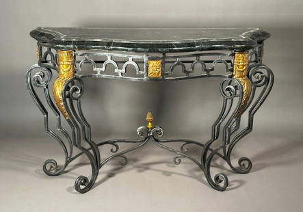 Modern Travertine Veneer and Wrought Iron Console Table: Modern Travertine Veneer and Wrought Iron Console Table, Serpentine black marble or Travertine top raised on a black iron base with cabriole legs and brass accents. Dimensions: 31.5 x 18 x 49.5 in. Co