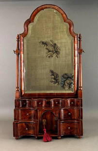 English Queen Anne Walnut Dressing Mirror, 18thc.: English Queen Anne Walnut Dressing Mirror, 18thc. With scalloped frame mirror centering a beveled mirror plate, the mirror turning on a pair of turned standards, on a rectangular base fitted with conc