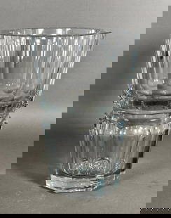 Baccarat Crystal "Edith" Vase: Baccarat Crystal "Edith" Vase, of octagonal tapered panel form, acid stamped signature to base. Dimensions: 12 in.h. x 8 in. dia. Condition: Small chips to foot at each edge.