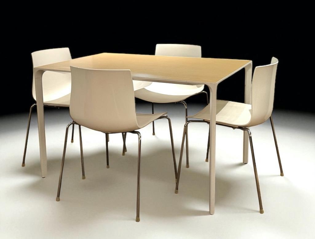 Simon Pengelly for Arper, Nuur Table and Four Catifa Chairs: Simon Pengelly for Arper, Nuur Table and Four Catifa Chairs, rectangular table with wood grain laminate top and white powdercoated aluminum frame, the chairs in white composite on steel legs. Dimensio