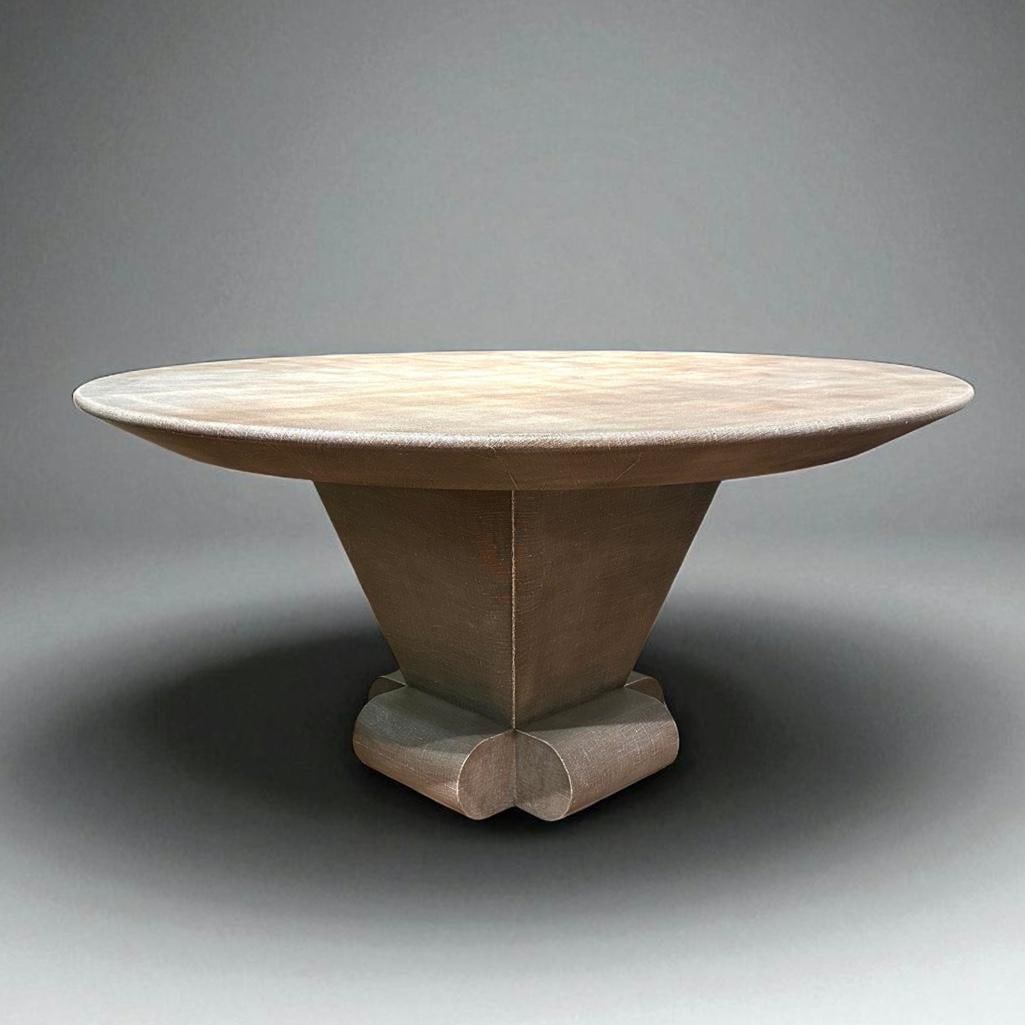 Custom Lacquered Linen Finish Dining or Center Table: Custom Lacquered Linen Finish Dining or Center Table, contemporary, the circular top on squared tapered pedestal base with four half round feet at base, in gray linen with a lacquer finish. Featured i
