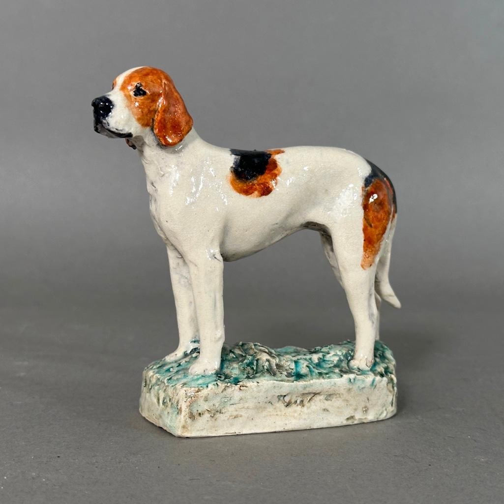 Kathleen Wheeler Crump Ceramic Figure, Fox Hound: Kathleen Wheeler Crump (British/American 1884-1977) Hand modeled glazed ceramic figure of a Fox Hound, single standing figure on a grassy base. With incised signature to base. Dimensions: 4.5 x 4.5 x
