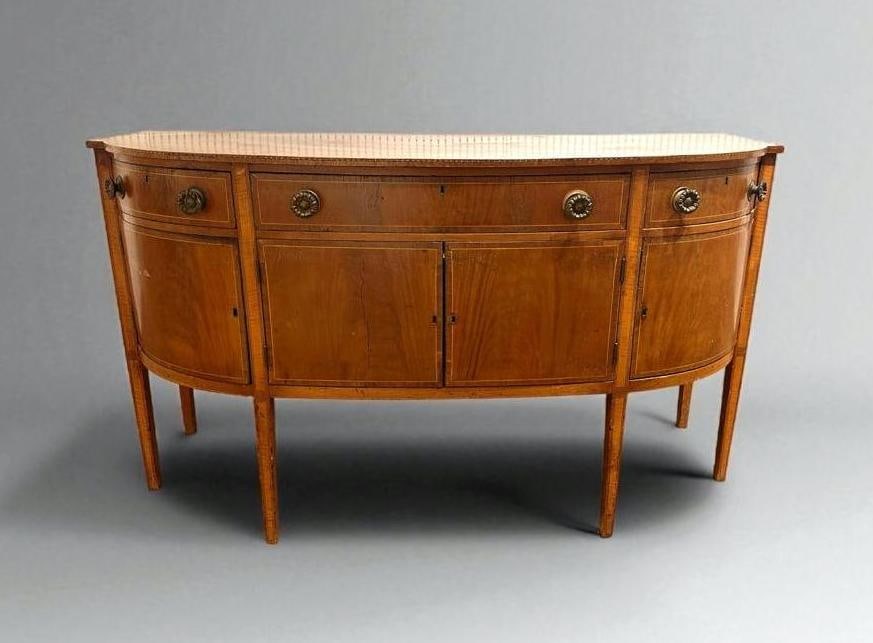 American Hepplewhite Mahogany and Satinwood Inlaid Sideboard, c.1800: American Hepplewhite Mahogany and Satinwood Inlaid Sideboard, c.1800, with D-shaped top line inlaid, over one long and two short curved drawers above a pair of hinged center doors, with a pair of hing