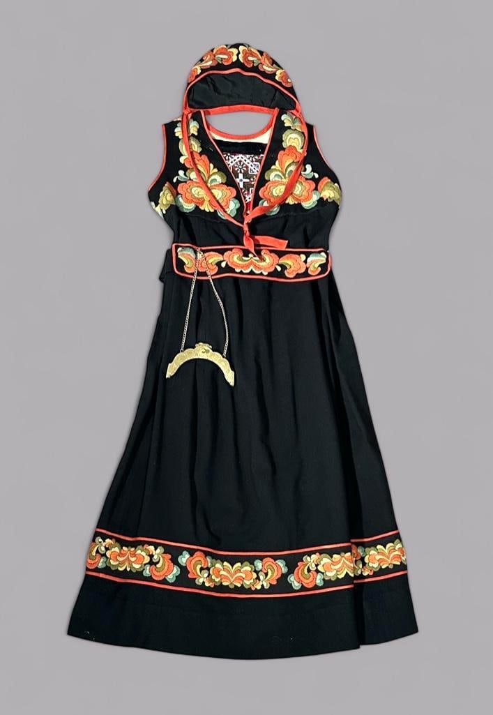 Norwegian Bunad Traditional Costume, Vintage: Handmade black wool dress with wool embroidery near hem, chest, with embroidered sash and cap. Bead-worked embroidered chest covering, attached by push pins, Comes with brass purse frame. Condition: p