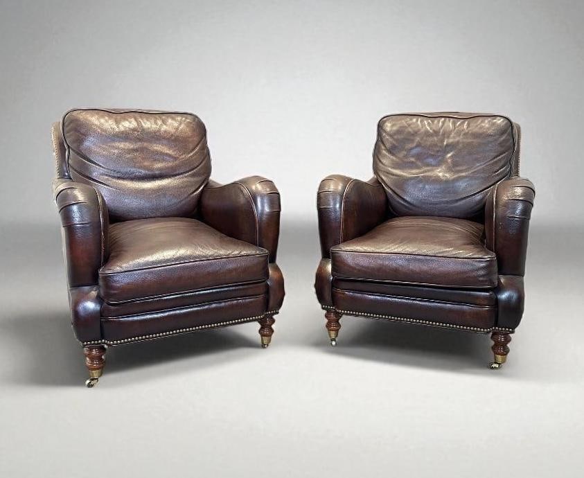 Pair of Whittemore-Sherrill Leather Lounge Chairs: Pair brown leather club chairs, nail head trim, pleated leather armrests, turned wood feet. Apprx 36"T x 31"W x 40"D. Condition: very good, no noted damage or scuffing, like new.