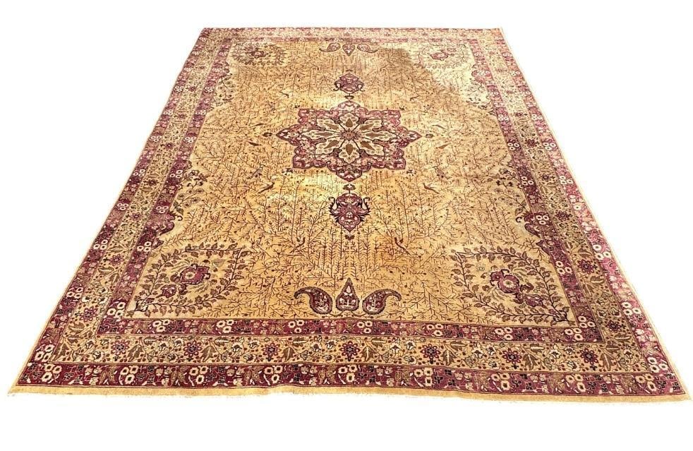 Agra Silk and Wool Carpet 12' x 8"4": Agra, Wool with silk, low pile carpet with central medallion and extensions, corner guards, tan ground with linear branch design overall, with little birds throughout, multiple borders, short fringe e