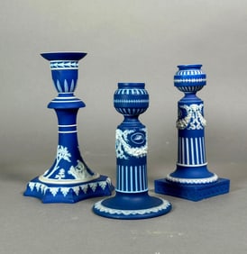 Three Wedgwood Dark Blue Jasperware Candlesticks, English, 19th century