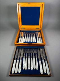 Two Boxed English Mother of Pearl and Silver Plate Fish Sets