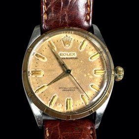 Rolex Oyster Perpetual 6564 Steel/18K Gold Watch