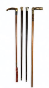 Four Antique Walking Sticks
