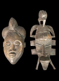 Two African Carved Wood Masks, Senufo Kpelie and Baule