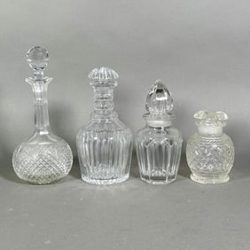 Four Assorted Glass and Crystal Decanters
