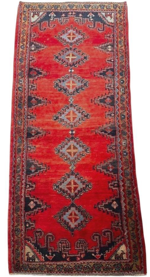 Persian Markazi Runner 8'9" x 3'8": Persian Red Runner 8'9" x 3'8". Seven diamond medallions in center, small animal motifs in corners. Wool on cotton weft. With natural abrash, short fringe ends. Condition: Small repai