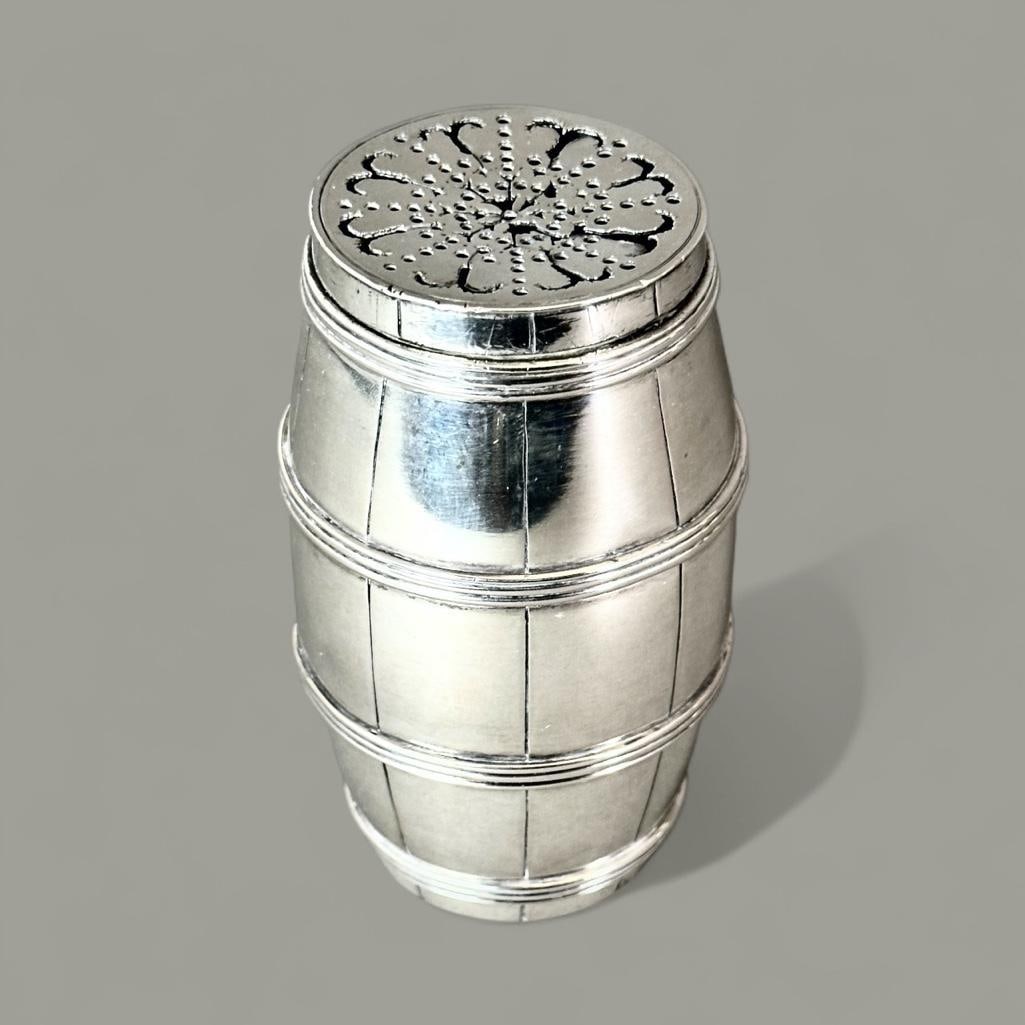 Austro-Hungarian or German .800 Silver Sugar Caster: Austro-Hungarian or German .800 Silver Sugar Caster, Barrel form with pierced cover. Hallmarked. Dimensions: 4.25 in.h. Total Approximate Weight: 223 g. Condition: Dent to side of barrel form and the
