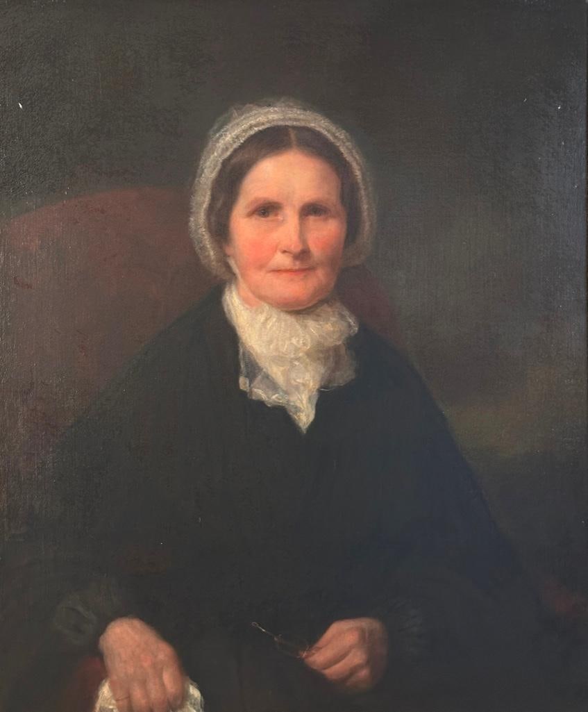 Richard Morell Staigg Oil, Portrait of a Woman Holding Her Glasses: Richard Morell Staigg (American 1817-1881) Portrait of a Woman Holding Her Glasses, oil on canvas, dated lower right, 1889 and 18[6]8 (?) With old applied handwritten label verso inscribed with the ar