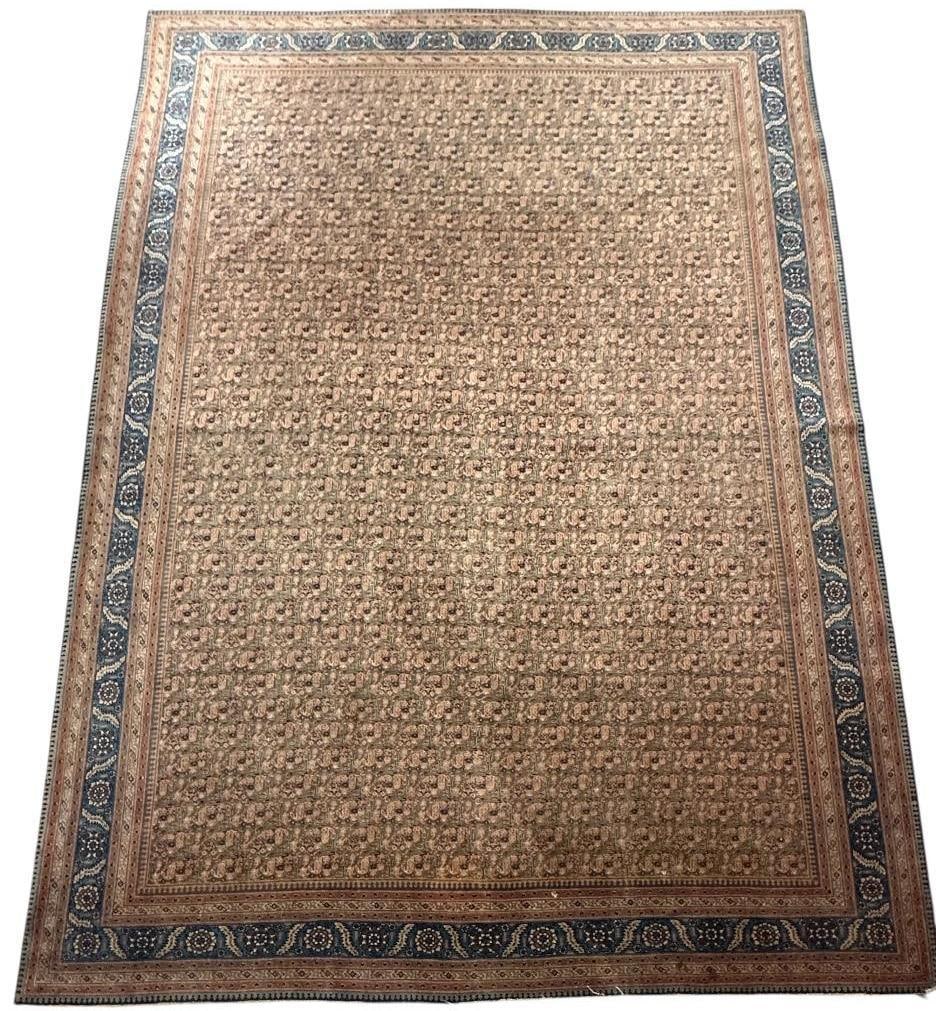 Antique Herati Carpet 14'1" x 10'3": Antique Tabriz carpet with all-over herati fish design, with multiple small borders flanking a medium size blue border with flower heads and leaves, the edge is trimmed with a double blue spearhead