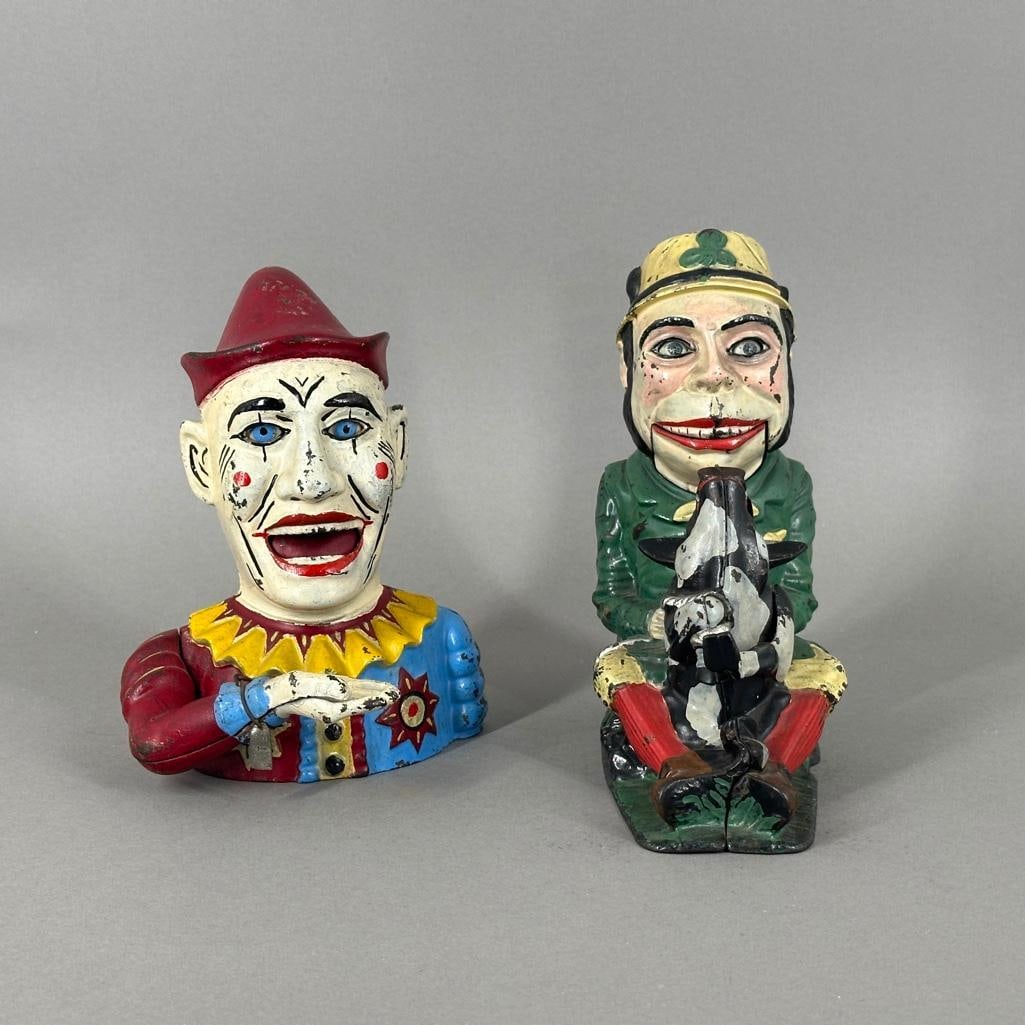 "Paddy and His Pig" and "Humpty-Dumpty" Cast Iron Mechanical Banks: "Paddy and His Pig" and "Humpty Dumpty" Cast Iron Mechanical Banks, green coated Irish figure holding a black and gray spotted pig and a brightly painted clown. Dimensions: Paddy: