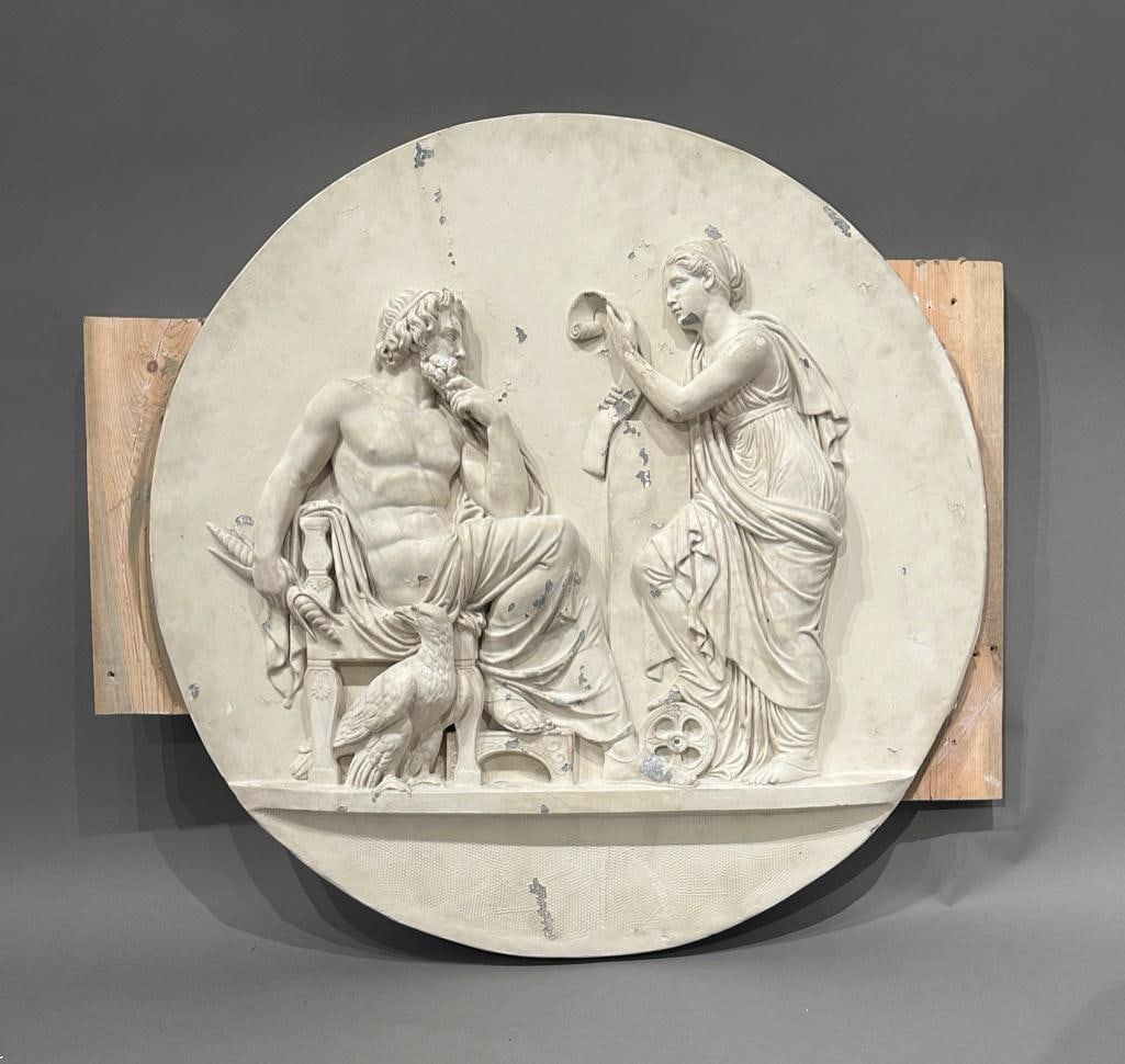 Large Plaster Rondel By Bertel Thorvaldsen, "Jupiter and Nemesis": Bertel Thorvaldsen (Danish 1770-1844) "Jupiter and Nemesis," depicting Nemesis reciting the deeds of Men to Jupiter, the original 1808-1810, large plaster rondel plaque cast in relief,