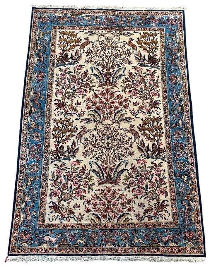 Wool and Silk Qum Carpet 6'8" x 4'6": Wool and Silk Qum Carpet 6'8" x 4'6", in a hunting design with woodland animals, select areas in silk, providing a shine and contract to the thick wool.