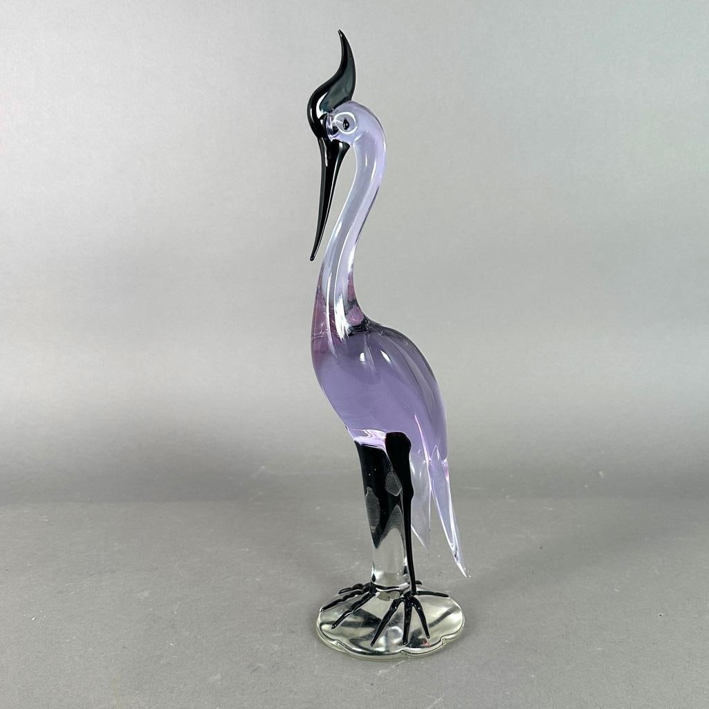 Glass Bird by Gino Mazzega, ca. 1950: Translucent lavender glass bird, with clear and black glass, signed under the base G. Mazzega. Apprx 14.5"T. Possibly for Cenedese Studio or Murano. Condition: excellent-no damage.