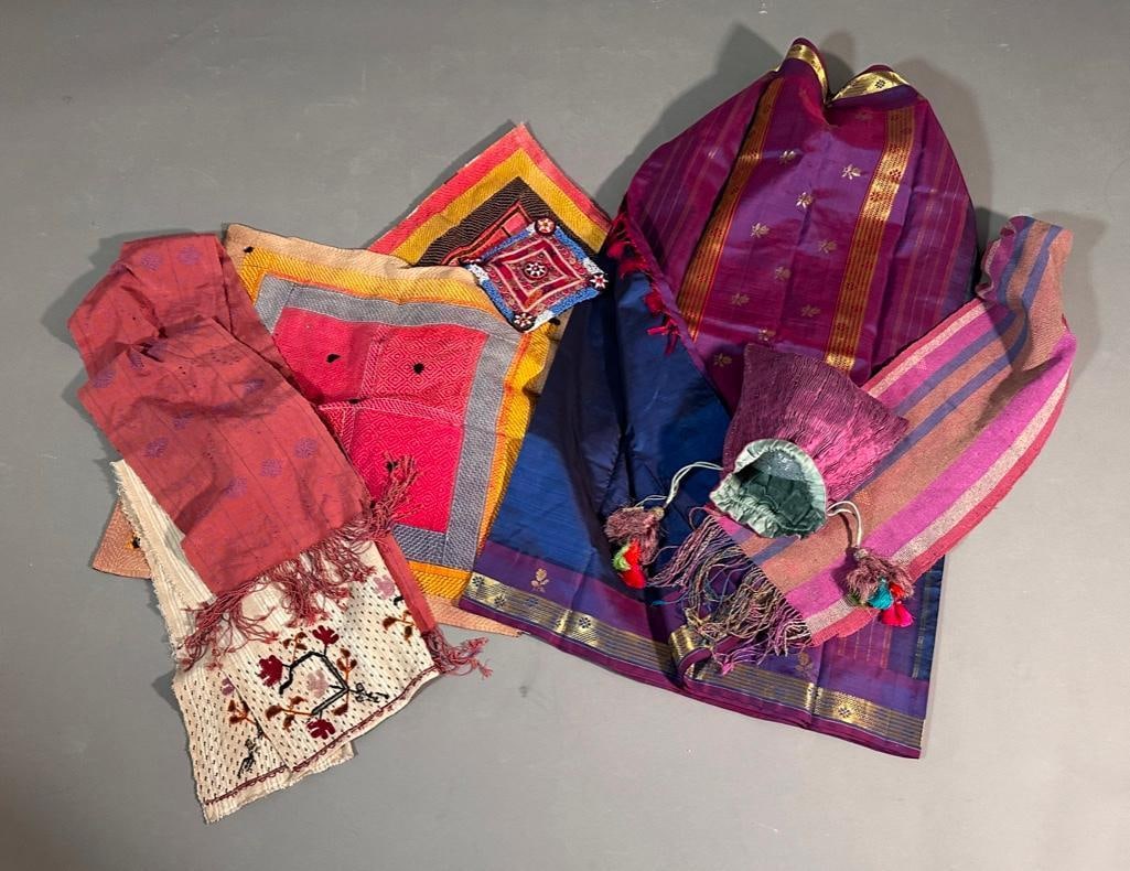 Group of Indian Textiles: Group of Indian Textiles, comprising two Banjara pillow covers with stitched designs and silk backings with tie fasteners, 25 x 24.5 in.; a Pashtun Teapot Cover, with beads and mirrors, 7.5 x 7 in.; a