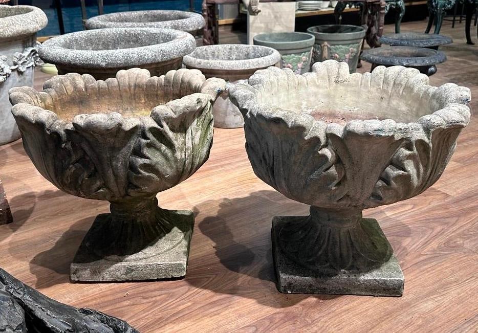 Pair of Cast Stone Garden Planters, Leaf Forms: Pair of Cast Stone Garden Planters, Leaf Forms. Cast as large overlapping leaf forms on pedestal base and squared foot. Dimensions: 15 in.h. x 18 in. dia. Condition: Good with wear from outdoor use. A