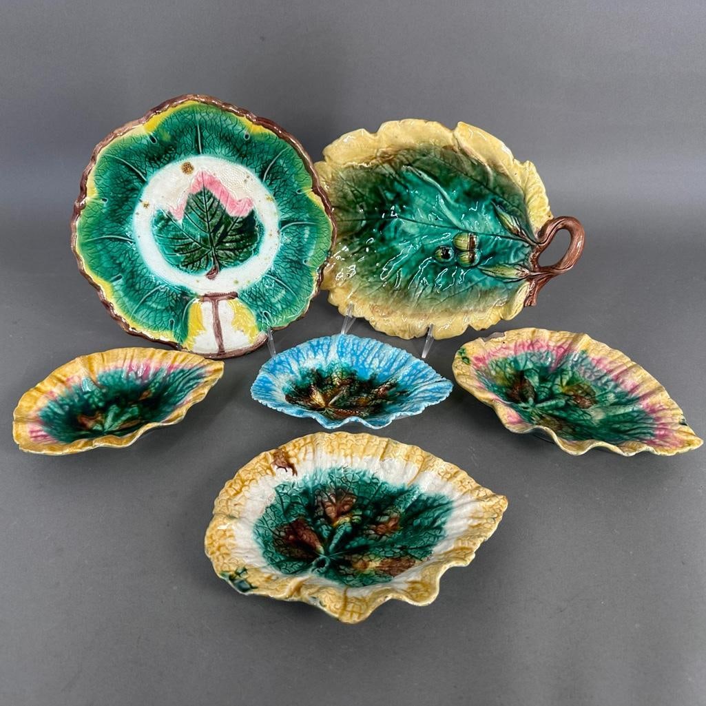 A Collection of Majolica Serving Pieces: Antique Majolica service pieces, great for entertaining; 12-1/2"L oak leaf tray with branch handle small foot, decorated with acorns; two 9"L Etruscan Majolica cabbage leaf plates, including a th