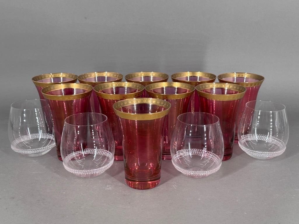 Set of Ten Vintage Neiman Marcus Pink Tumblers and Four Juliska Tumblers: Made in Poland; the rim is trimmed in 24K gold, and embossed with small hanging hearts in the gold rim. Clear pink color with a touch of iridescence. Apprx 5-1/2"T, 3-3/4"D rim. Stickers on bo