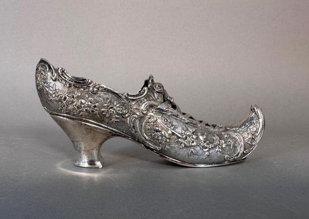 Continental Silver Ladies Shoe Inscribed "Antoinette de Lamar" dated 1898: Continental Silver Ladies Shoe Inscribed "Antoinette de Lamar 1898 25 April 1898", engraved to back of shoe heal. Two hallmarks under heal, presumed 800 silver, apprx. 6.25"L x 2.75"T 