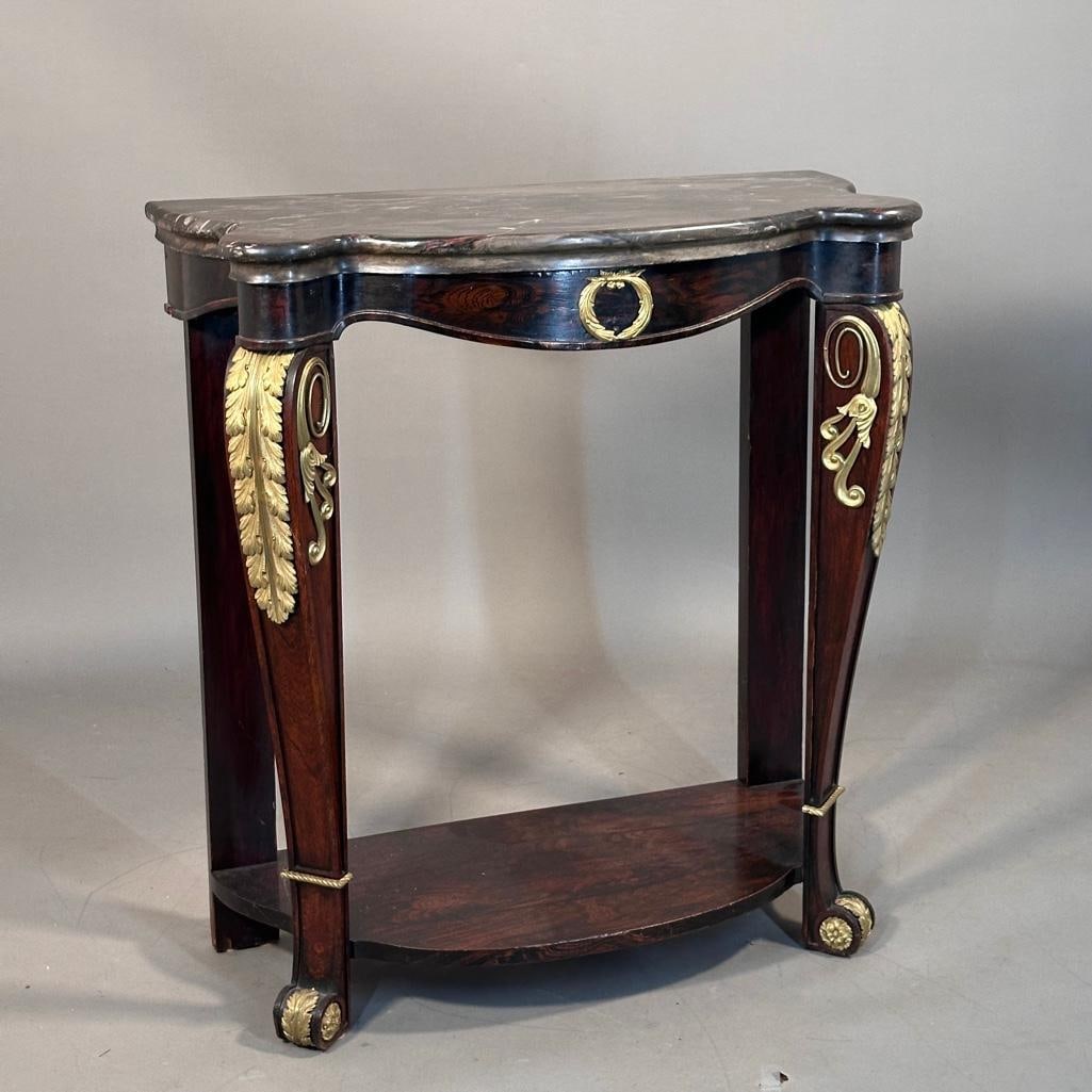 Faux Bois Painted Bronze Mounted Console with Marble Top: Faux Bois Painted Bronze Mounted Console with Marble Top, 19thc. With serpentine black veined marble top over conforming faux bois frieze, painted to simulate Rosewood, fitted with a gilt bronze wreat