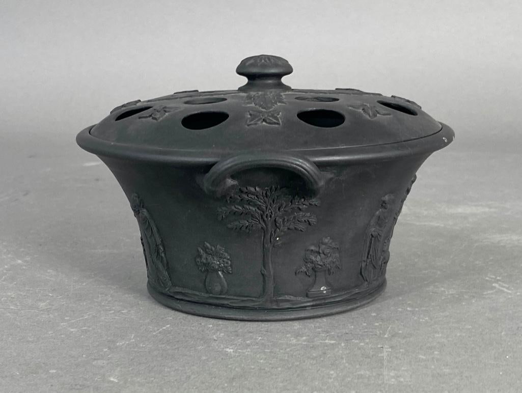 Wedgwood Black Basalt Potpourri and Cover, 18thc.: Wedgwood Black Basalt Potpourri and Cover, 18thc. Domed pierced cover with anthemion knop and applied handles, decorated with classical figures and scenes around the base, impressed Wedgwood to base w