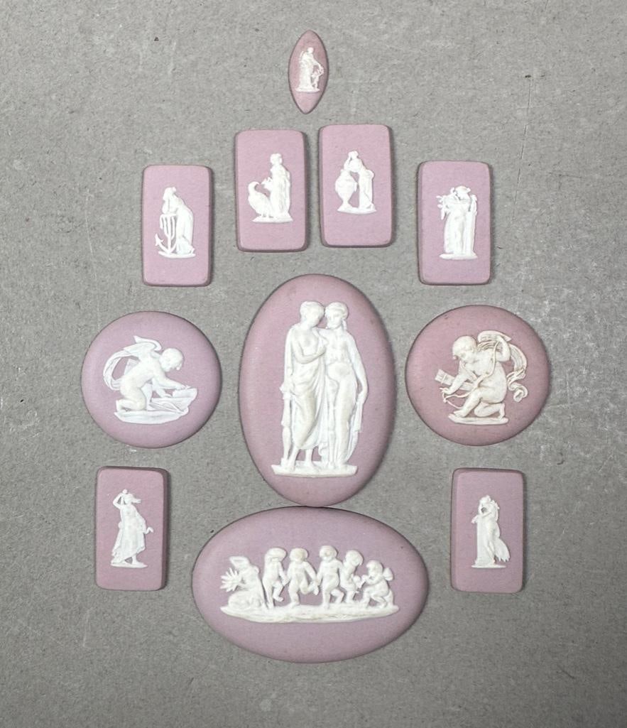Eleven Small Loose Wedgwood Lilac Jasper Medallions: Eleven Small Loose Wedgwood Lilac Jasper Medallions, various subjects including cupids and classical muses, signed. Dimensions: Largest 2 x 1.5 in. Condition: Very good with no damage or restoration.